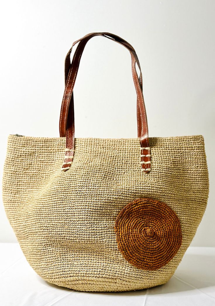 Handwoven from sun-kissed raffia fibers, this chic accessory boasts timeless appeal. Whether you're exploring the city or attending a garden soirée, this handbag combines practicality with natural elegance. 🌿 Features: Lined Interior: Keep your essentials organized. Secure Zipper Top: Safely store your belongings. Leather Handles: A touch of sophistication. 📏 Approximate Dimensions (may vary slightly): Length (L): 16 inches Width (W): 11 inches Thickness (T): 4 1/2 inches 🌟 Lightweight at ~1. Orange Circle, Summer Lovin, Chic Accessories, Zipper Top, Circle Design, Summer Accessories, Leather Handles, Sun Kissed, Perfect Summer