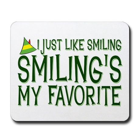 a white mouse pad that says i just like smiling, smiling's my favorite