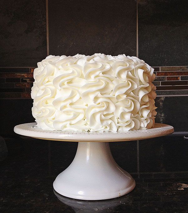 a white cake sitting on top of a table