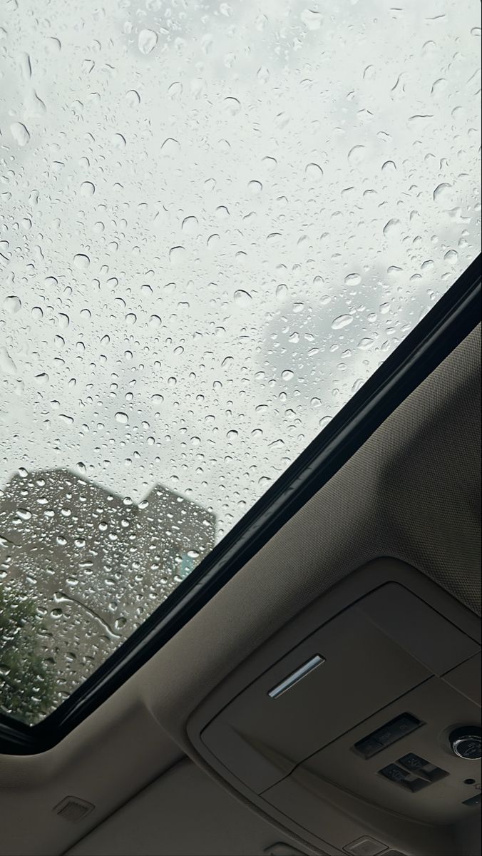 rain drops on the windshield of a car