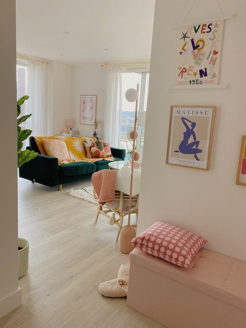 a living room filled with furniture and decor