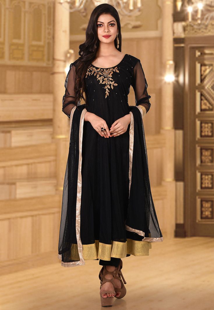 Readymade Net Anarkali Kameez in Black This Hand Embroidered attire with Taffeta Lining is Prettified with Zari, Resham, Cutbeads and Stone Work Available with a Taffeta Churidar and a Net Dupatta in Black The Kameez and Bottom Lengths are 48 and 44 inches respectively Do note: Accessories shown in the image are for presentation purposes only.(Slight variation in actual color vs. image is possible.) Latest Anarkali Suits, Cotton Anarkali Suits, Net Anarkali, Georgette Anarkali Suits, Black Anarkali, Indian Anarkali, Designer Anarkali Suits, Cotton Anarkali, Zardozi Embroidery