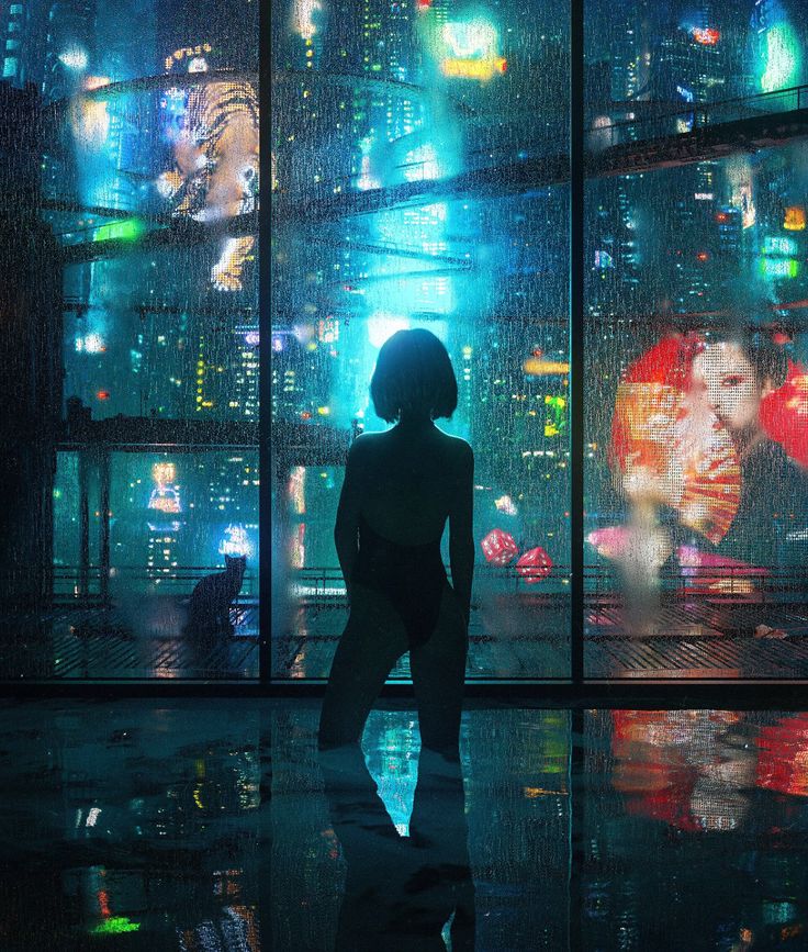 a woman standing in front of a window with city lights behind her and the reflection on the floor