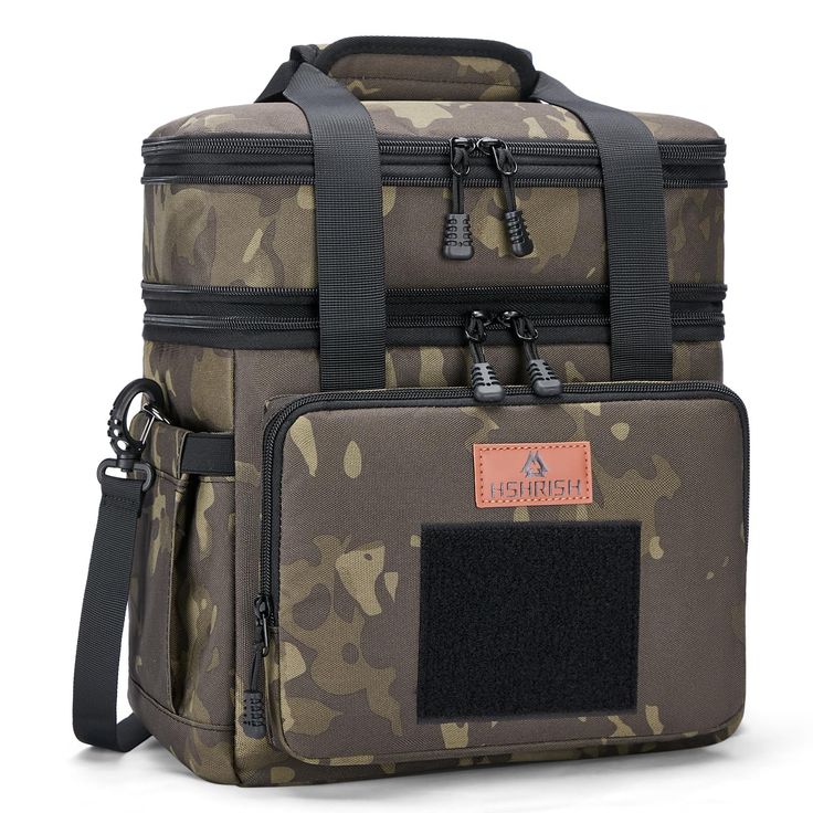 a camo bag with black straps and an orange tag on the front, sitting against a white background