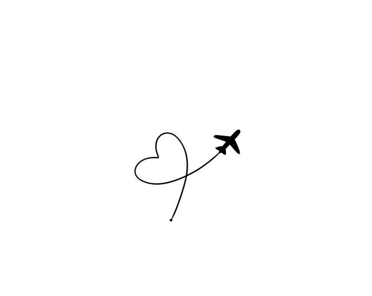 an airplane flying in the sky with a heart drawn on it