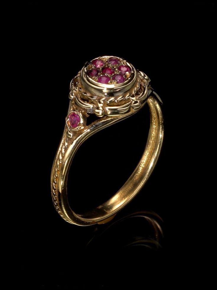 Unique victorian antique style 14K ring with 9 small canter ruby stones. Vintage ring. Top width : 1cm. *14K Solid Gold, we don't offer any plated or gold filled jewellery at all. Free Shipping for all orders . I offer a lifetime craftsmanship warranty on all of my jewellery. I resize all rings for life free of charge. Antique Ruby Ring Vintage, Yellow Gold Ruby Ring With Intricate Design For Promise, Victorian Ruby Ring With Center Stone, Victorian Ruby Ring In Yellow Gold With Intricate Design, Victorian Yellow Gold Ruby Ring With Intricate Design, Victorian Ruby Ring For Wedding, 14k Yellow Gold Ruby Ring With Intricate Design, Victorian Style Ruby Ring For Wedding, Victorian Style Ruby Wedding Ring