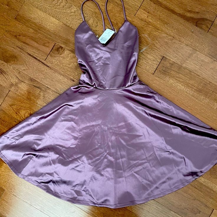 Brand New And Never Worn My Daughter Picked Out Several Dresses To Possibly Wear For A Wedding And This One Wasn’t It. It’s Listed As Dusty Plum Or Mauve Color And Is Very Pretty. Purple V-neck Homecoming Dress, Purple A-line Dress For Night Out, Summer Party Mini Dress In Mauve, Mauve Summer Party Mini Dress, Mauve Mini Dress For Date Night, Purple Satin Dress With Spaghetti Straps, Mauve Mini Length Dress For Night Out, Mauve Mini Length Dresses For Night Out, Purple A-line Cocktail Mini Dress