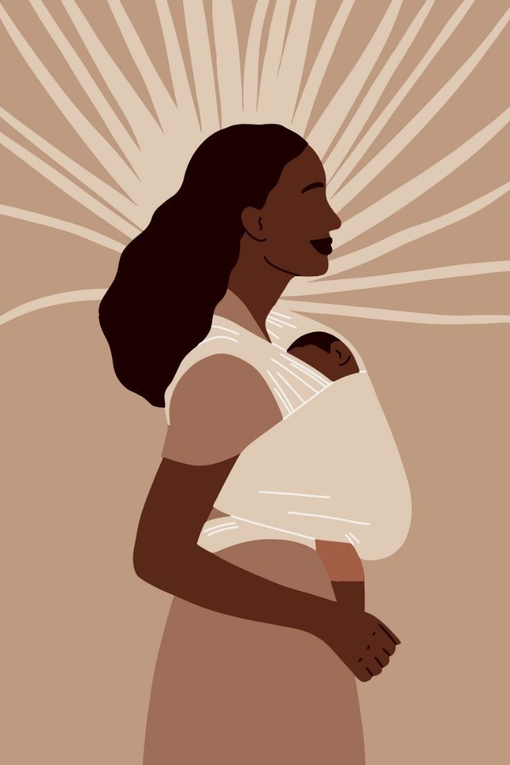 a woman holding a baby in her arms with the sun shining down on her face