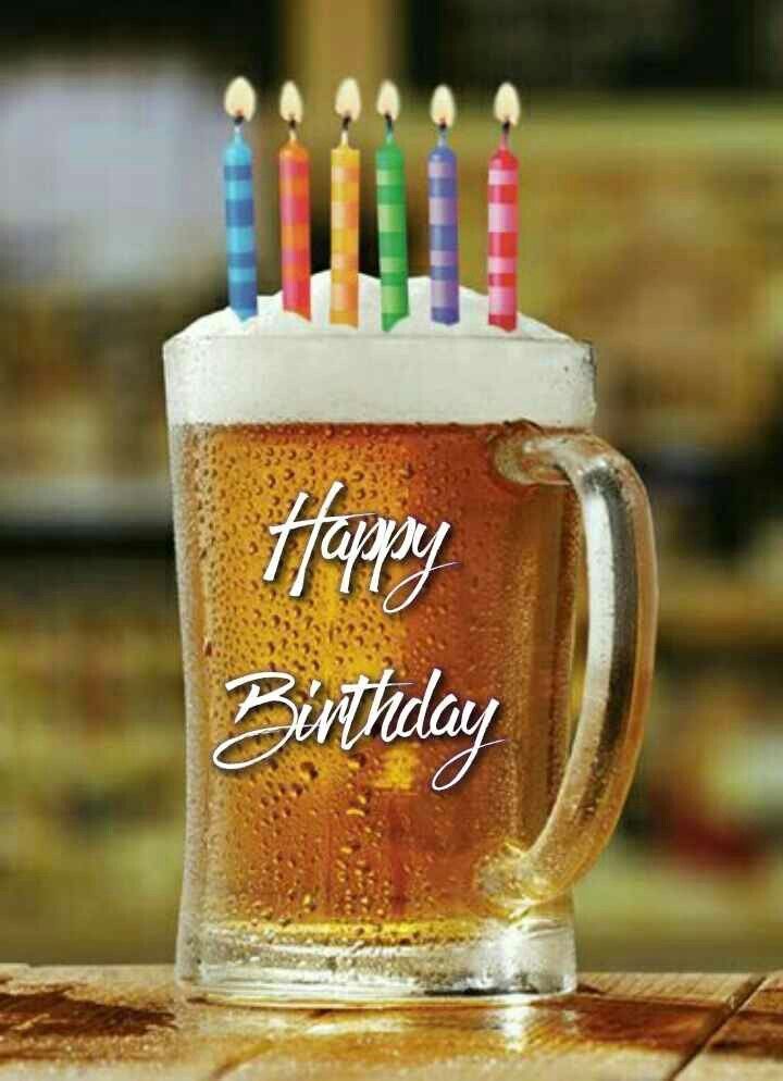 a beer mug with candles on it that says happy birthday