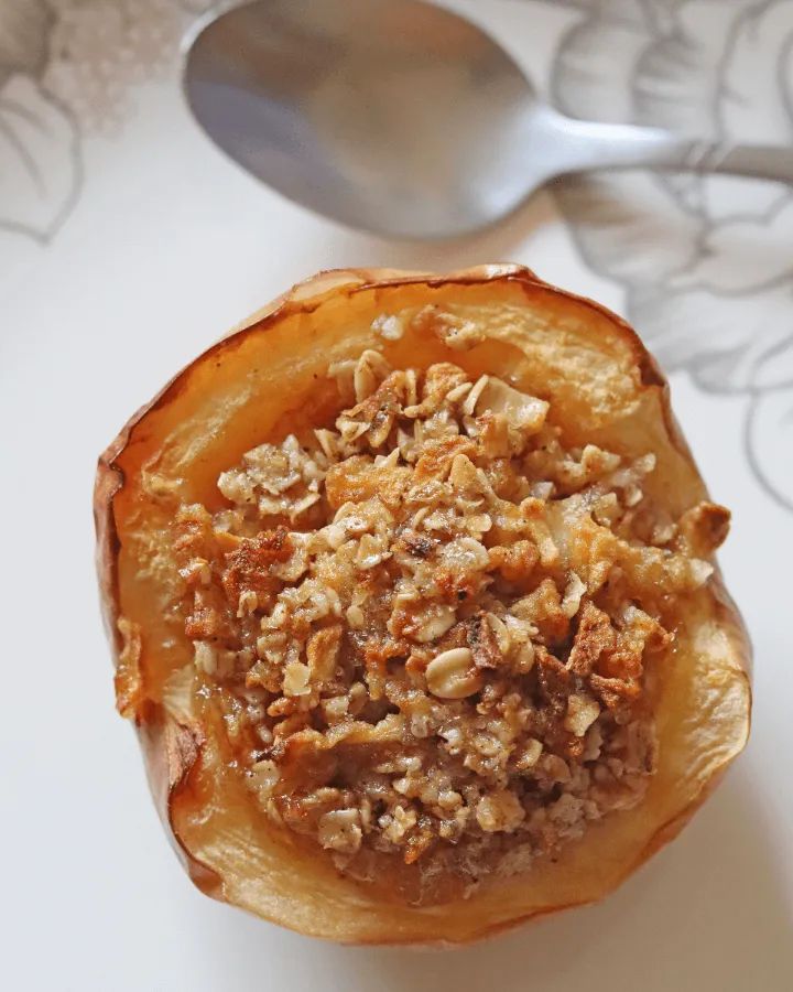 an air fryer baked apple with granola topping