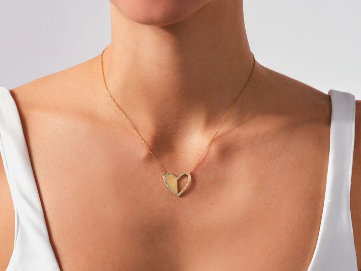 More than just jewelry, it's a symbol of affection. The Heart Necklace in 14k Solid Gold is a treasured piece that transcends trends. The minimalist design ensures the focus remains on the heartfelt symbol, making it perfect for everyday wear or special occasions. It's a perfect addition to your collection or a meaningful way to celebrate a love story. FEATURES• Made to Order• Gold Kt: 14k Solid Gold, 18k Solid Gold• Gold Color: Rose Gold, Yellow Gold, White Gold• Available Length Range: 14 Inch Everyday Yellow Gold Heart Necklace In Sterling Silver, 14k Gold Heart Necklace Fine Jewelry Tarnish Resistant, 14k Gold Tarnish Resistant Heart Necklace, Modern Jewelry With Heart Charm As Gift, 14k Gold Tarnish Resistant Fine Heart Necklace, Minimalist Heart Pendant Jewelry With Diamond Cut, Modern Jewelry With Heart Charm For Gift, Delicate 14k Yellow Gold Heart Necklace, 14k Gold Tarnish-resistant Fine Heart Necklace