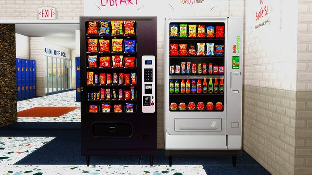 two vending machines are in the middle of a room with blue carpet and white walls