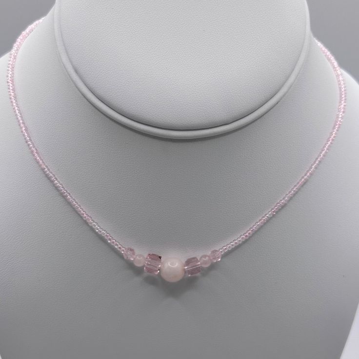 16 Inch Light Pink Glass Seed Beads. Light Pink Crystals With Rose Quartz Round Beads. Stretch Cord Used. Slip Over Your Head. Handmade Piece. Never Worn. Rose Quartz Choker, Beaded Rose Quartz Necklaces With Faceted Round Beads, Rose Quartz Beaded Necklaces With Faceted Beads, Beaded Rose Quartz Crystal Necklace, Beaded Rose Quartz Round Bead Jewelry, Pink Beaded Crystal Necklaces With Round Beads, Pink Beaded Crystal Necklaces, Light Pink Necklace, Light Pink Jewelry