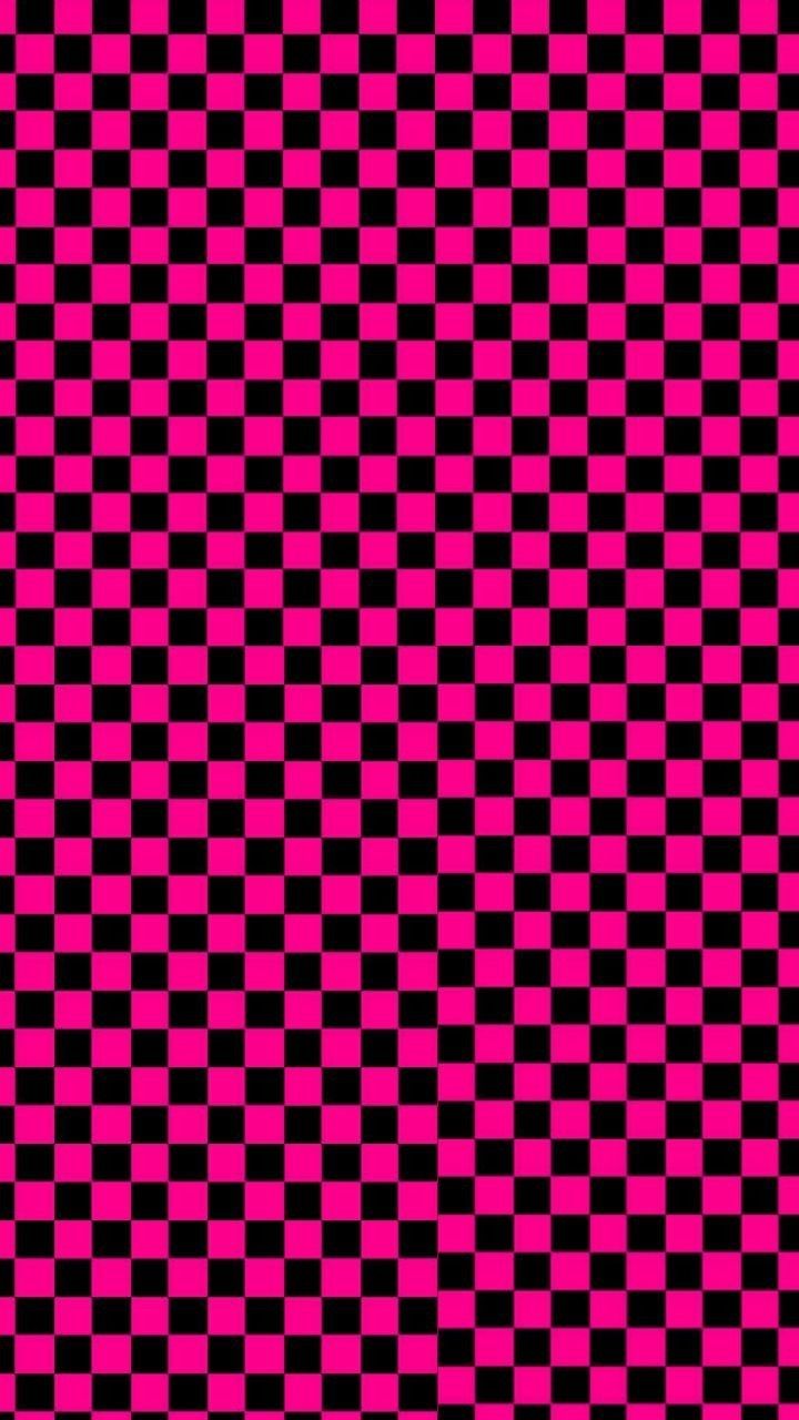 a pink and black checkerboard pattern that looks like it is going to fall