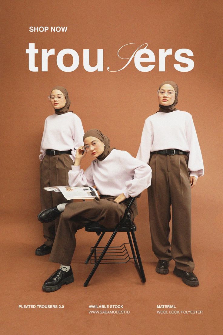 two women in white shirts and brown pants are sitting on a chair