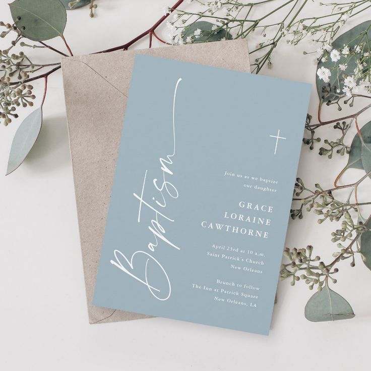 a blue and white wedding card with the word faith written in cursive font