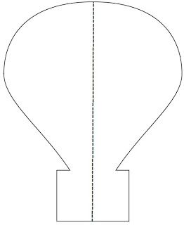 an image of a light bulb cut out from the paper and ready to be used