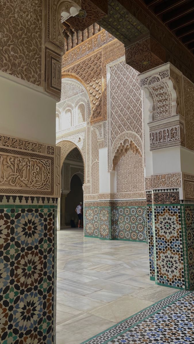 the interior of an ornate building with colorful tiles and patterns on it's walls