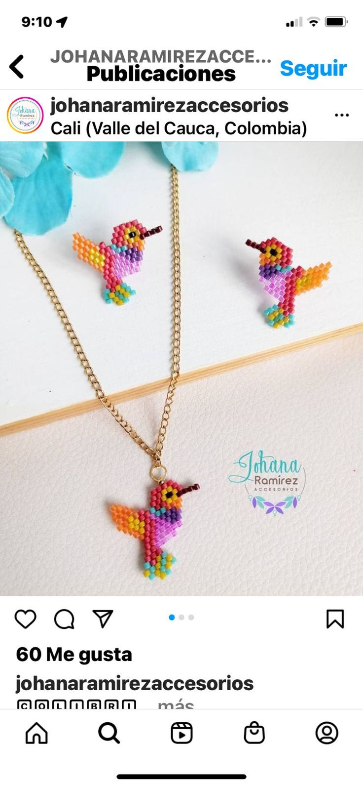 the necklace and earrings are made out of multicolored plastic beads with gold chains