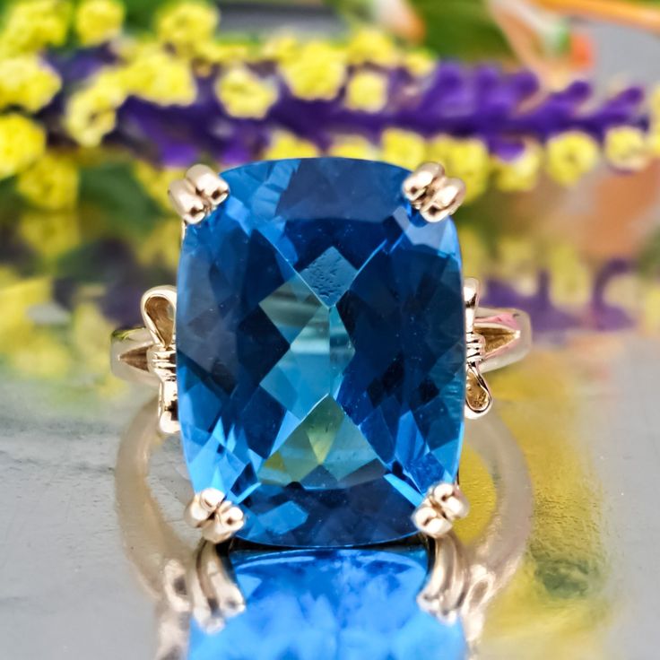 12.50 Carat Natural London Blue Topaz 14k Solid Gold Ring Ring Material: 14k Solid Gold Total Metal Weight: 6.2 Grams Gemstone: Natural London Blue Topaz Gemstone Color: Dark Blue Gemstone Shape: Cushion Cut Gemstone Dimensions: 16.00x12.00 mm Gemstone Quantity: 1 Gemstone Carat Weight: 12.50 Carat Ring Quantity: One Ring Condition: New Delivered in an elegant gift box Made in the USA 💜 Please do not hesitate to ask any questions and we will be happy to assist You 💜 London Blue Topaz Ring, Jewellery Box Making, November Birthstone, Blue Topaz Ring, London Blue Topaz, Topaz Gemstone, London Blue, Topaz Ring, Ring Ring