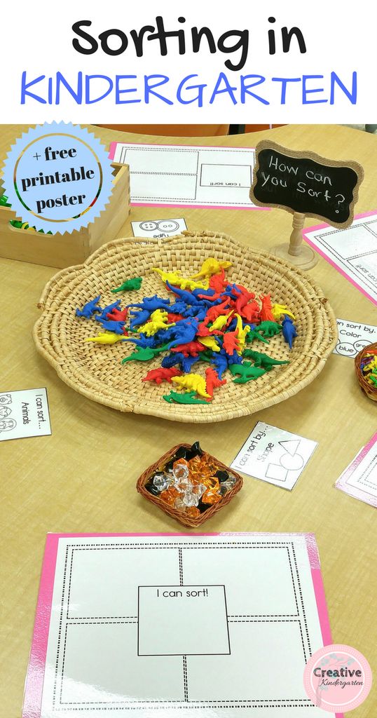 a table topped with lots of different types of toys and paper on top of it