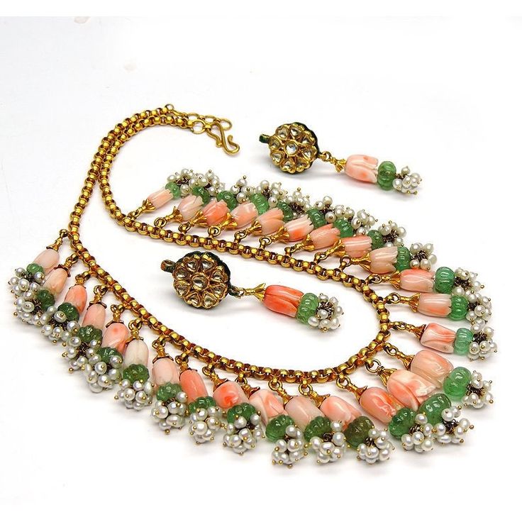 "Unique Vintage Coral Necklace Set 22k gold and single cut Diamond RARE find. Never Worn Vintage Indian Moughal Coral Emerald Necklace Set . 15\" length necklace. Coral - 110-135 cts Emerald- 30-45 cts Pearl 20-22 cts Single Cut Diamond 1 ct 22k Gold 40-42 gms Carved Light double colored Coral - Never Worn - in ORIGINAL condition - excellent condition with NO problems. Original Natural Carved Emerald Beads. The Earrings Measure 1.93 inchx.58 inch. Coral in the earrings measure .38inchx.29inch. E Emerald Necklace Set, Coral Jewelry Vintage, Coral Jewelry Set, 22k Gold Necklace, Pearl Necklace Designs, Beaded Necklace Designs, Coral Jewelry, Summer Necklace, Emerald Necklace