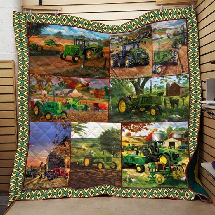 a quilt with pictures of farm vehicles on it