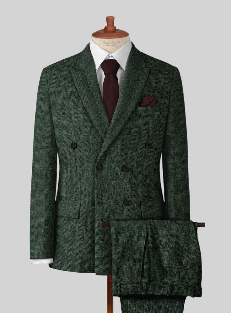 Make an entrance in our Bottle Green Herringbone Tweed Suit that isn't afraid to let its true colors fly. Crafted from wool, the suit features a herringbone pattern that develops a bit of texture and mystique, while its bottle green color places itself in the super suave category, making it ideal for a distinctive appe Dark Green Tweed Suit, Blazer Reference, Green Wool Suit, Dark Green Suit, Green Tweed Suit, Green Suit Men, Husband Fashion, Brown Tweed Suit, Grey Tweed Suit