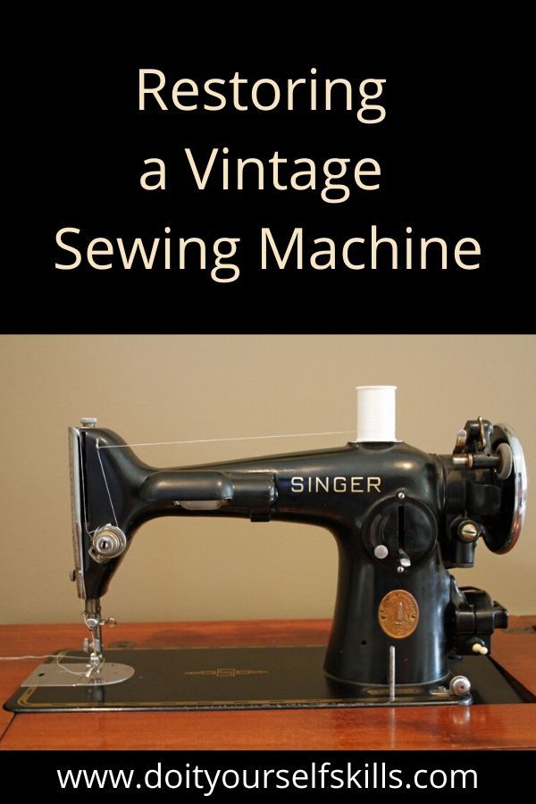 an old sewing machine sitting on top of a wooden table with the words restoring a vintage sewing machine