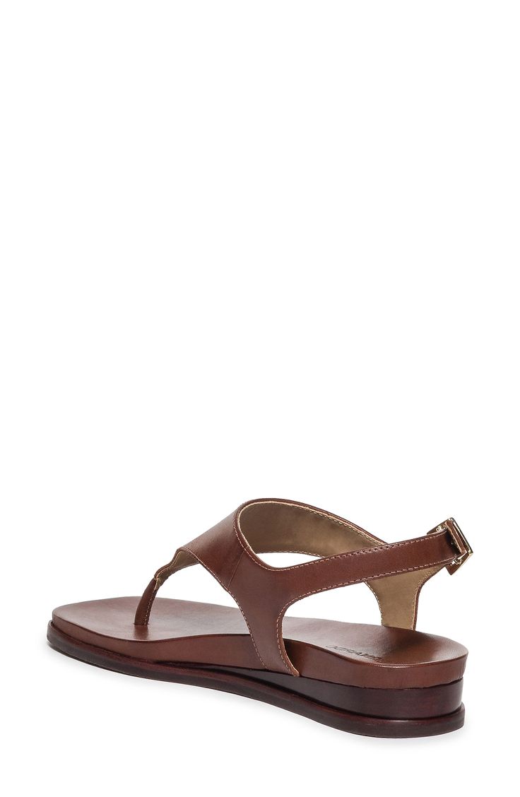 A rich leather upper lends timeless appeal to a summer-ready sandal secured with a center toe post and adjustable slingback strap. Adjustable slingback strap with buckle closure Leather upper and lining/synthetic sole Made in Brazil Brown Slingback Sandals With Buckle Closure, Classic T-strap Sandals With Ankle Strap, Leather T-strap Sandals With Toe Loop And Buckle Closure, Elegant T-strap Slingback Sandals For Beach, Classic Open Toe Slingback Sandals With Leather Sole, Classic Leather Slingback Sandals With Ankle Strap, Classic Leather Ankle Strap Slingback Sandals, Classic Leather Slingback Sandals With Buckle Closure, Leather T-strap Sandals With Leather Lining