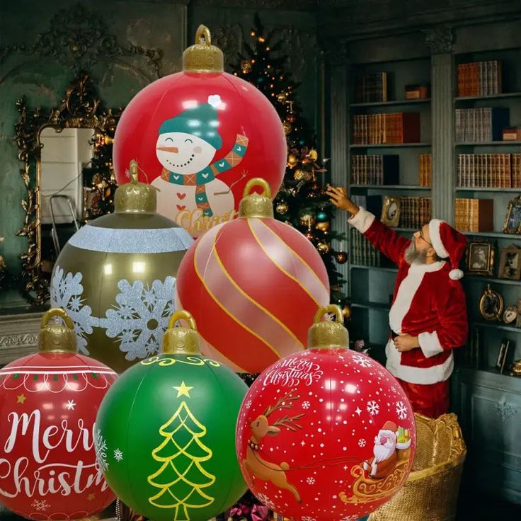 there are many christmas ornaments on display in front of a man dressed as santa claus