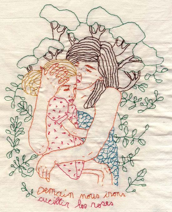 two women hugging each other in front of flowers and leaves on a white paper towel