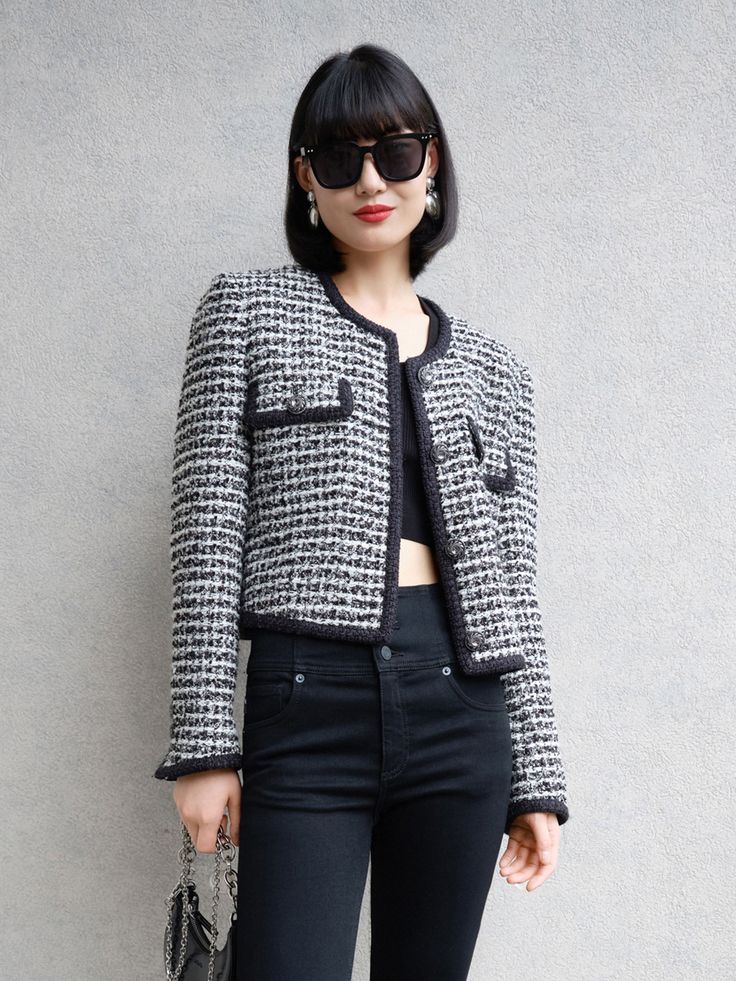 MO&Co. Women's Wool Blend Tweed Crop Jacket Features : - Collarless, crop design- Textured touch- Buttons closure Code: MBB4COTT03The back length of size S is 48cmMATERIALS & CARE Material: 49.5% Wool 20.6% Polyester 16.6% Acrylic 9.5% Polyamide 3.8% Polyester film fibreDo not wash, do not bleachHang to dry, do not tumble dryLow temperature ironing, professional dry cleaningDo not expose to the sunNote: Wrap metal parts before dry cleaningREMINDER: All items are measured manually. Please note th Black Tweed Outerwear For Spring, Black Casual Tweed Jacket For Spring, Spring Black Tweed Jacket, Black Cropped Jacket For Winter Office Wear, Black Tweed Office Jacket With Pockets, Black Tweed Outerwear With Houndstooth Pattern, Black Houndstooth Tweed Jacket, Black Tweed Jacket With Houndstooth Pattern, Fitted Black Tweed Jacket With Houndstooth Pattern