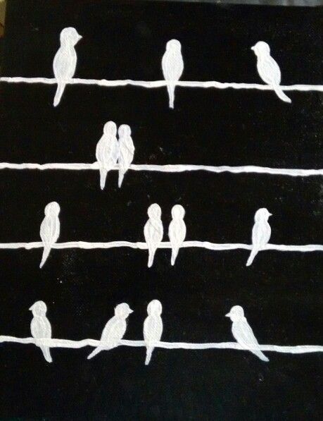 white birds sitting on wires painted on black canvas