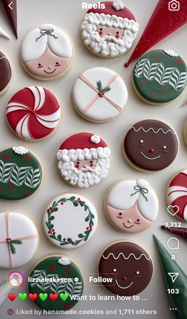 decorated cookies are arranged in rows on a table