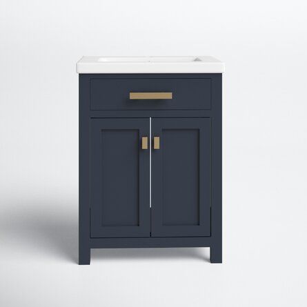 a bathroom vanity with a white sink and dark blue cabinet