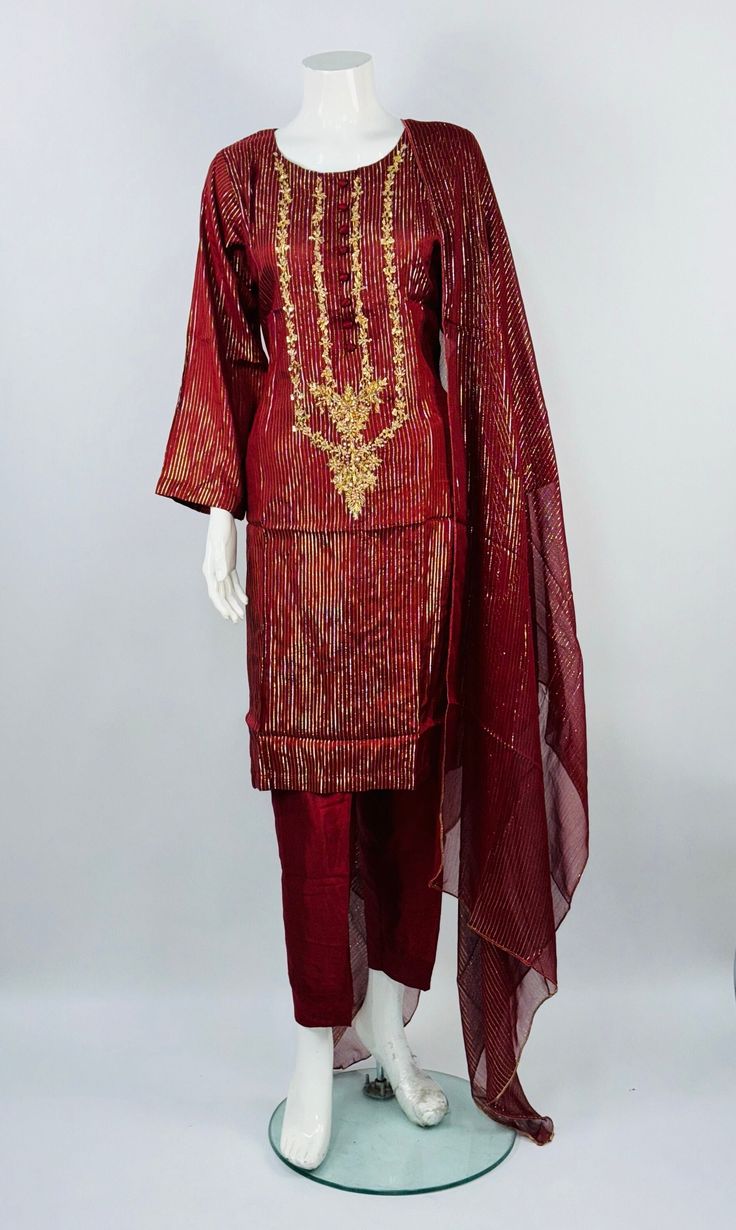 Introducing a Silk Embroidered Dress in Deep Red. Finished with embroidery along the chest. The measurements are as follows... Small shoulders; 15.5 inches Chest; 15.5 inches hips; 16 inches sleeves; 21 inches medium shoulders; 17.5 inches Chest; 17.5 inches hips; 18 inches sleeves; 23 inches Large shoulders; 19.5 inches Chest; 19.5 inches hips; 18 inches sleeves; 23 inches extra large shoulders; 21.5 inches Chest; 21.5 inches hips; 20 inches sleeves; 25 inches Recommended care is to wash by han Festive Red Salwar Kameez With Floral Embroidery, Red Floral Embroidered Sets For Eid, Festive Red Sets With Floral Embroidery, Festive Red Set With Floral Embroidery, Fitted Red Salwar Kameez With Dabka Work, Red Semi-stitched Set With Floral Embroidery, Traditional Red Fitted Lawn Suit, Traditional Fitted Red Lawn Suit, Fitted Red Salwar Kameez With Intricate Embroidery