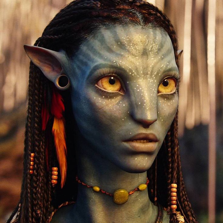 an alien woman with blue skin and yellow eyes