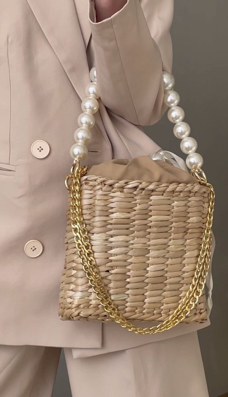 Handwoven Straw tote handbag with one small pearl beaded handle cream color and long shoulder gold chain is perfect for summer vacation, weddings, evening cocktail. You can use this bag like shoulder bag or like crossbody bag. Handbag includes fabric insert to safety your belongings! Pearl handle straw tote bag is oh so Parisian chic and elegance. This lovely tote hand bag with a unique beaded handle. It is square in shape and perfect to carry. Beaded straw bag most popular trend spring-summer 2 Summer Evening Bag With Pearl Handle, Handheld, Summer Evening Bag With Pearl Handle As Gift, Summer Beige Shoulder Bag With Pearl Handle, Chic Beige Straw Bag For Gift, Chic Beige Straw Bag As Gift, Elegant Rectangular Shoulder Bag For Summer, Summer Cream Shoulder Bag With Pearl Handle, Beige Rectangular Bucket Bag For Party, Beige Shoulder Bag With Pearl Handle For Vacation