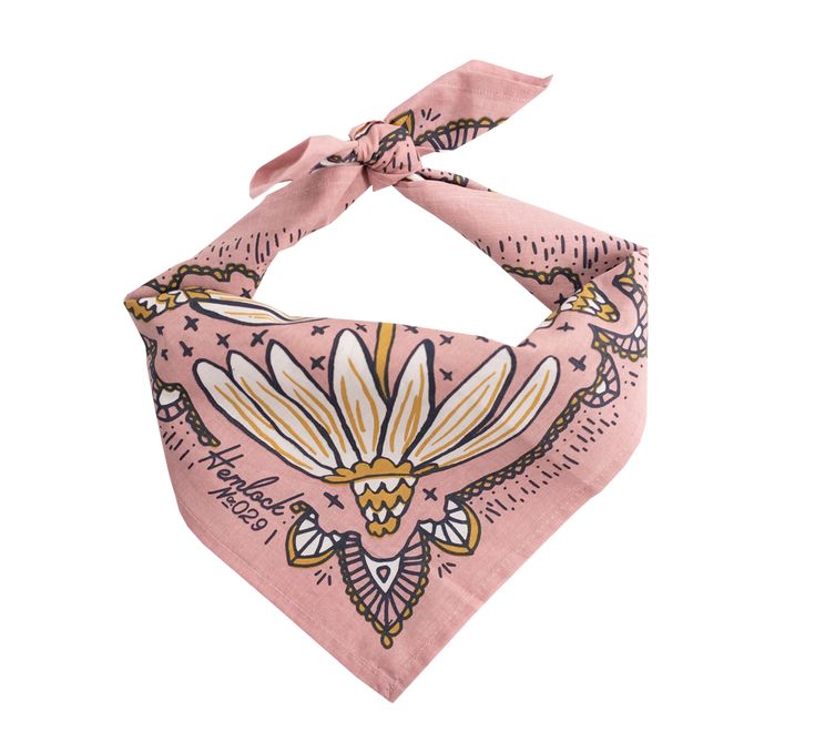 a pink bandana with an image of a flower on the front and side of it