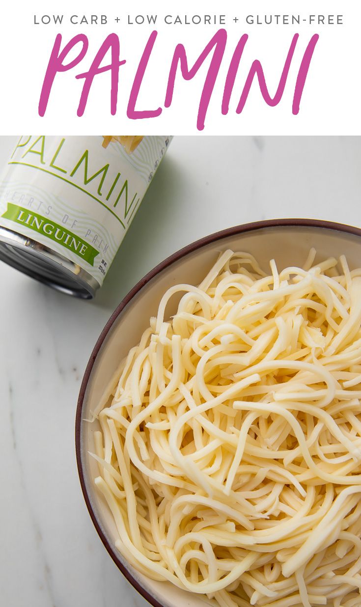 a bowl filled with pasta next to a can of gluten - free palmi