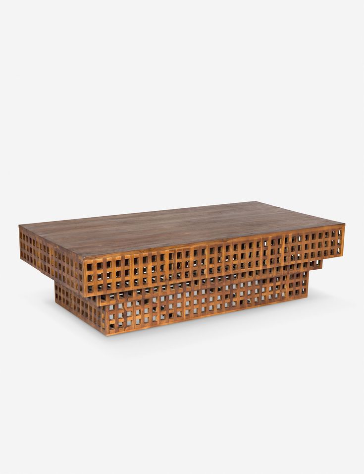 a wooden table with lattice design on top