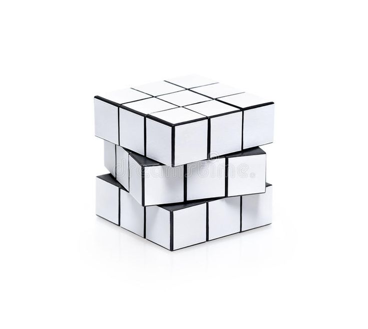 three white cubes stacked on top of each other with black and white squares in the middle