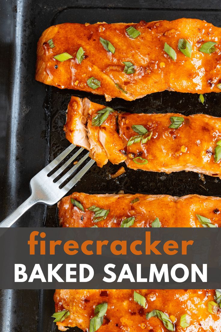 three baked salmon fillets on a baking sheet with a fork and title text reads, firecrackerr baked salmon