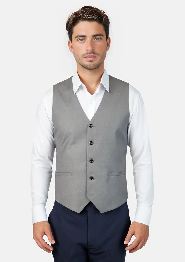 Look your best in the custom made Bryant Light Grey Twill Vest. This professional classic is designed to flatter and enhance any look. A timeless wardrobe staple, it's sure to be a reliable go-to item. Modern Fitted Solid Suits, Fitted Professional Blazer, Classic Gray Suits For Work, Classic Custom Fit Suits For Business Casual, Fitted Suit With Button Closure For Business Casual, Classic Custom Fit Blazer For Business Casual, Classic Fitted Outerwear With Pressed Crease, Fitted Classic Outerwear With Pressed Crease, Elegant Fitted Gray Blazer