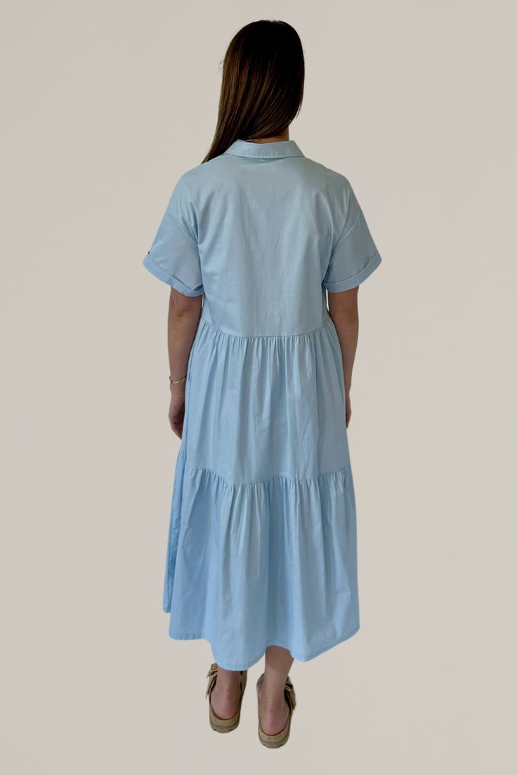 this functional and versatile short sleeve button down midi dress is perfect for everyday wear. it is an easy option for work worn with flats or sneakers, or can be dressed up with your go-to summer sandal. side pockets. lined. 100% cotton hand wash cold | line dry | iron low model is wearing a size small model's measurements (in black): 5'10" height, 32" bust, 24" waist, 36" hips all sale items are final sale Button Down Midi Dress, Tiered Midi Dress, Midi Short Sleeve Dress, Midi Shirt Dress, Romper With Skirt, Short Sleeve Button, Dress Romper, Hat Hairstyles, Handbags On Sale