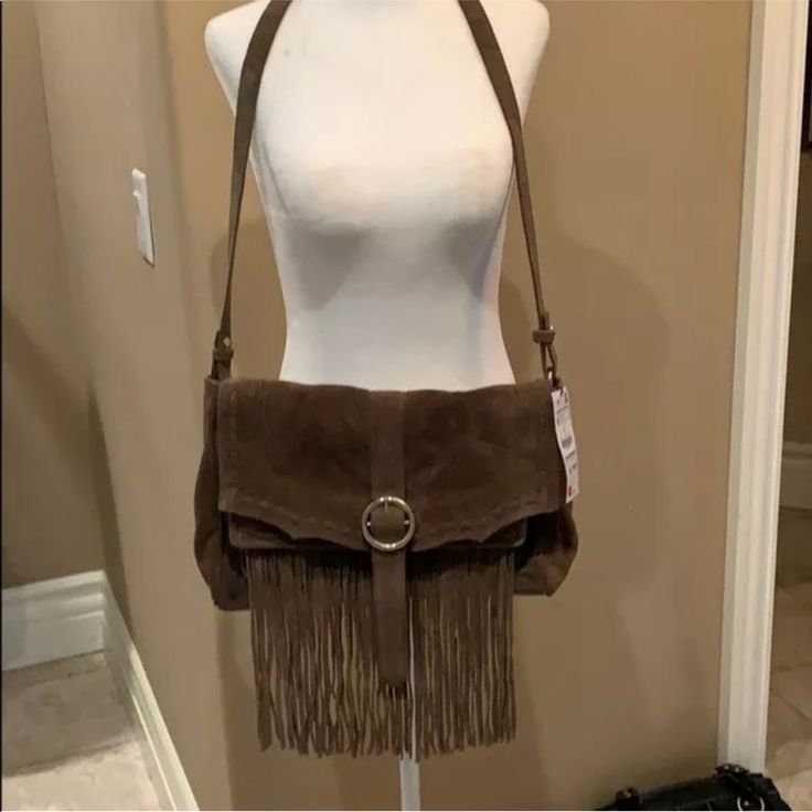 Brand New With Tag Zara Suede Leather Bag Is 15”W X 9”H X 3” Deep With @11.5” Long Fringe. Color Is Medium Brown. Silvertone Hardware. Magnetic Snap Close. 18” Strap Drop. One Interior Pocket. Interior Is Canvas. Elegant Zara Satchel For Travel, Elegant Zara Shoulder Bag In Soft Leather, Elegant Zara Soft Leather Shoulder Bag, Elegant Zara Soft Leather Bags, Zara Silver Shoulder Bag For Evening, Silver Zara Shoulder Bag For Evening, Chic Silver Zara Bags, Elegant Zara Crossbody Satchel, Zara Silver Evening Shoulder Bag