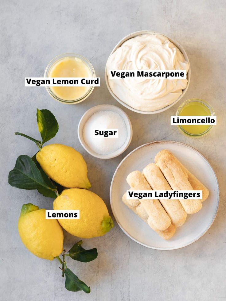 the ingredients for lemon curd on a plate