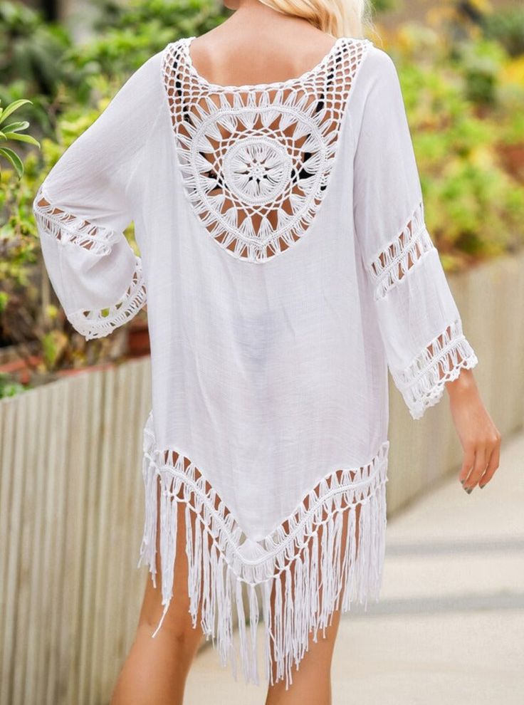 This stylish Beach Tunic is the perfect companion for your pool days. Crafted with resort style fringe knit design, its lightweight construction allows for maximum breathability and comfort. Perfect for lounging by the poolside, this tunic is sure to be a favorite! Style: Boho Chic Pattern Type: Solid Material: Nylon, Polyester, Rayon, Cotton Cotton Beach Cover-up For Beach Season, Summer Cotton Cover-up For Vacation, Bohemian Lightweight Cover-up For Beach Party, Summer White Cotton Cover-up, V-neck Beach Dress With Tassels For Vacation, White Cotton Cover-up For Warm Weather, Cotton Beach Season Cover-up For Vacation, Beach Season Cotton Cover-up For Vacation, White Cotton Beachwear Cover-up