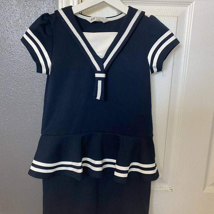 Never Worn. Sailor Dress. Size Us 8-10y. Navy Blue Color. Excellent Condition. No Stitches Problem. No Sticky And No Smell. Never Used. H&M Girls Sailor Dress Summer School Uniform Dress With Short Sleeves, Summer Short Sleeve School Uniform Dress, Casual Ruffled Dresses For School, Cute Navy Short Sleeve Dress, Casual Navy Dress For School, Navy Short Sleeve School Dress, Preppy Blue Dresses With Ruffles, Preppy Blue Dresses For School, Preppy Blue Ruffled Dresses